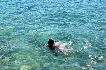 Girl swimming in Aegean Sea, Bodrum, Turkey