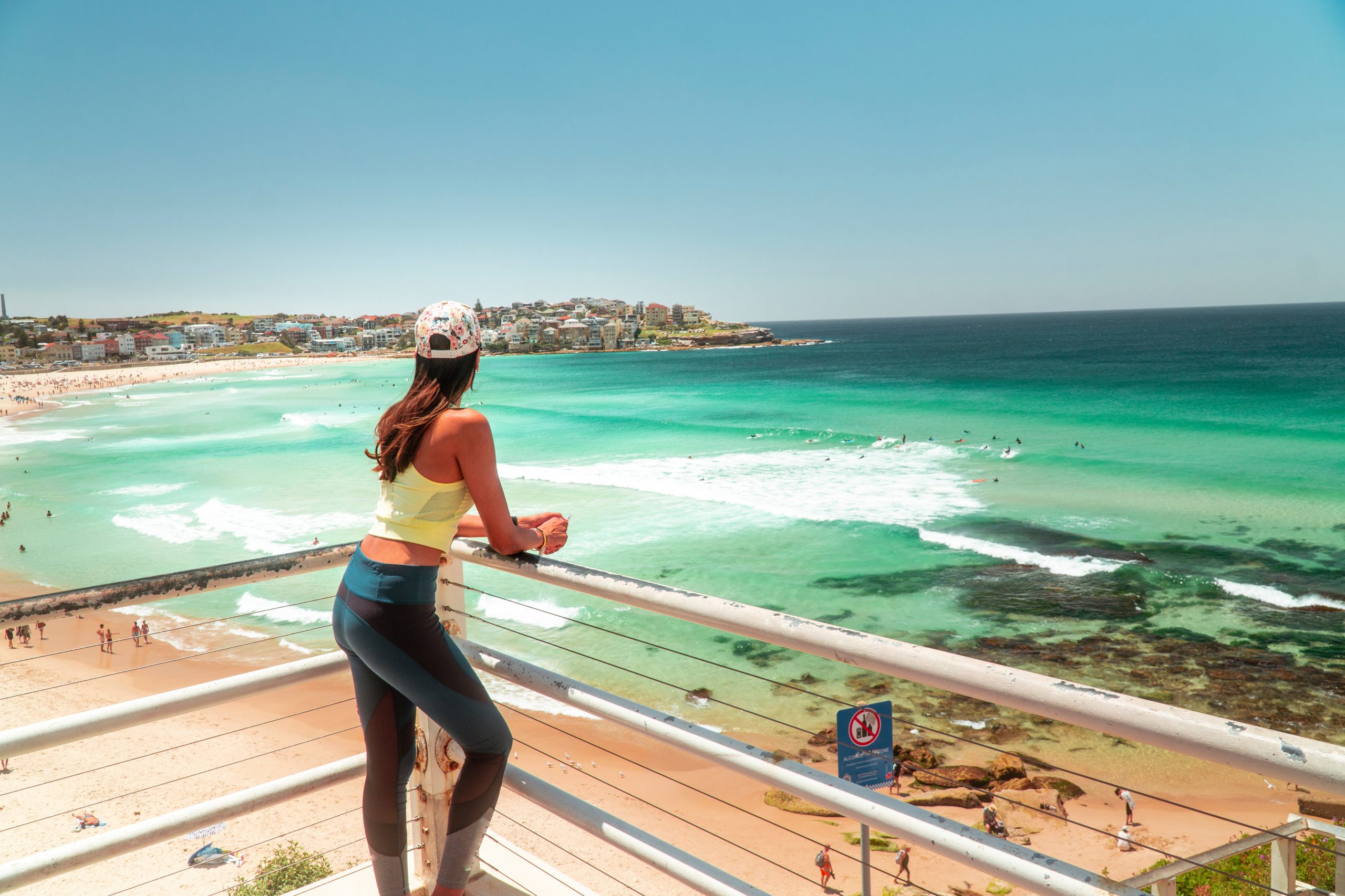 Woman in work out gear at Bondi Beach, Sydney, Australia.